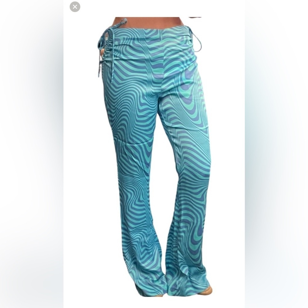 Zara Turquoise and Blue Striped Top
Caja 6